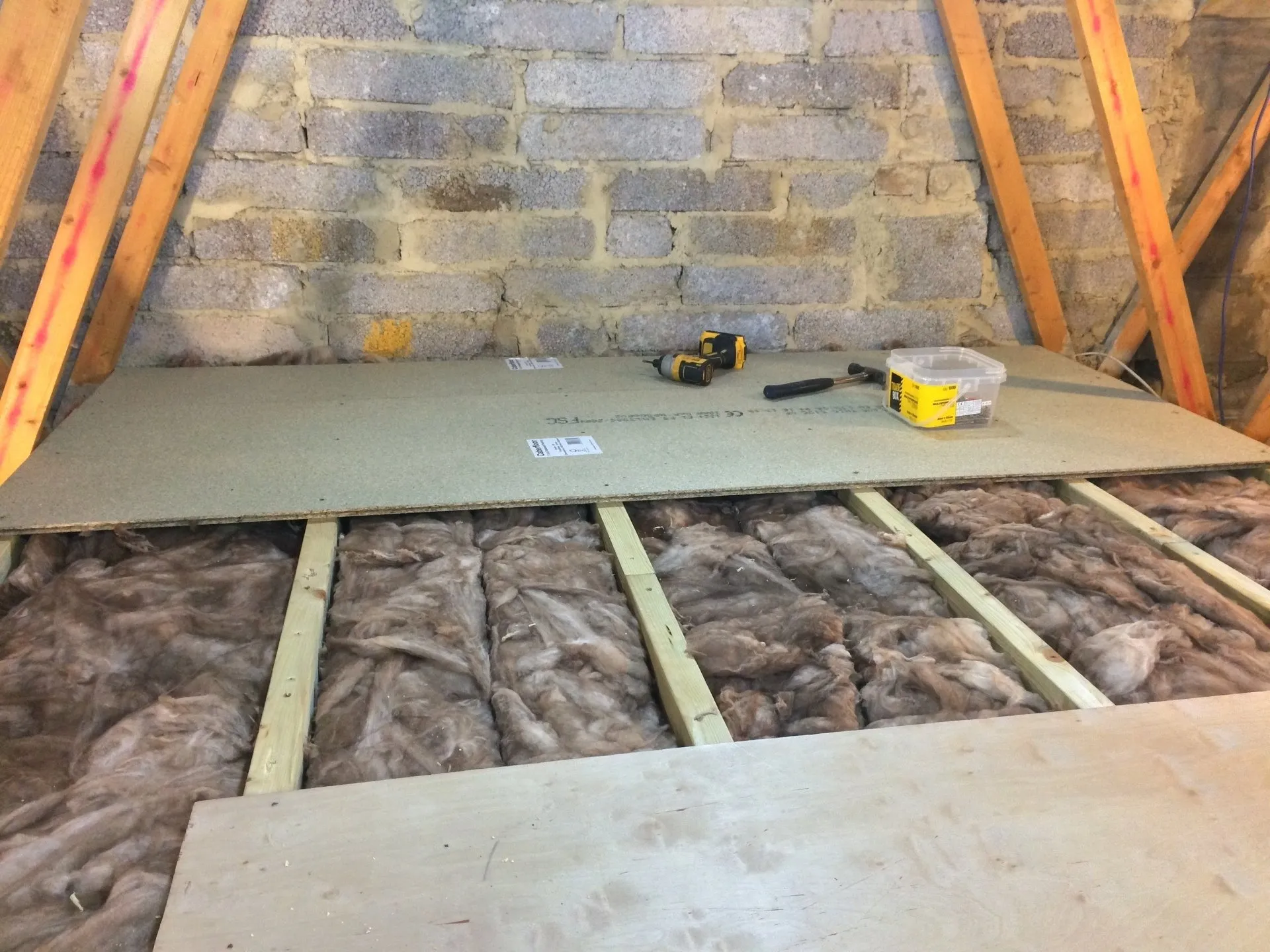 A close up of a wooden stair case