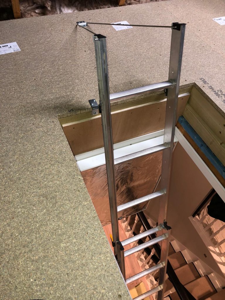 A close up of a wooden stair case